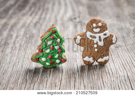 Gingerman And Christmas Tree Made Of Gingerbread Dough As Backgorund