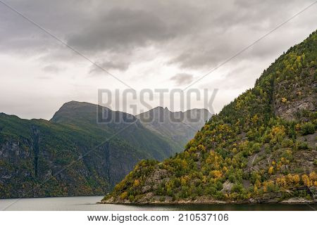 Geiranger fjord Beautiful Nature Norway. It is a 15-kilometre (9.3 mi) long branch off of the Sunnylvsfjorden which is a branch off of the Storfjorden (Great Fjord).