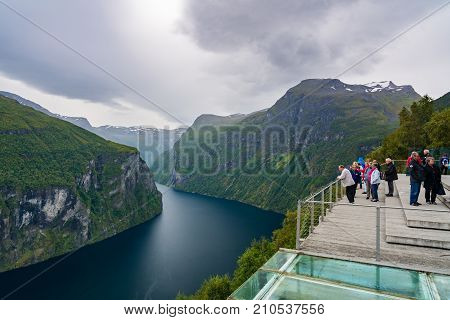 Geiranger Norway - September 5 2017: Geiranger is a 15-kilometre (9.3 mi) long branch off of the Sunnylvsfjorden which is a branch off of the Storfjorden (Great Fjord).