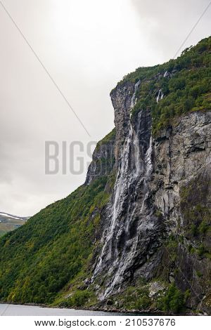Waterfall in Geirangerfjord called the Seven Sisters. It's one of the most popular waterfall of Norway