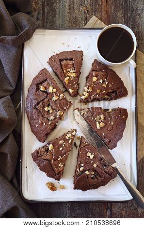 Kladdkaka Swedish chocolate cake and cup of coffee. Top view