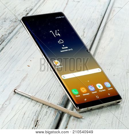 Koszalin, Poland - 24 October, 2017: Samsung Galaxy Note 8 on white background. Samsung Note 8 are new generation smartphone from Samsung. The Samsung Note 8 is smart phone with multi touch scren