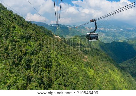 Cable Car To Fansipan Mountain With Valley Landscape On The Background