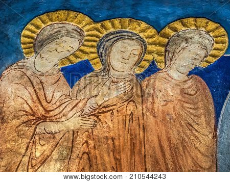 Three woman at the tomb of Jesus on Easter Sunday a romanesque wall-painting in Bjaresjo church Sweden November 6 2009