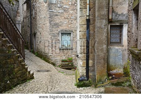 A small street in the hill village of Casso in Friuli Venezia Giulia north east Italy. With a population now of only 35 the village is famous locally for having being evacuated following the 1963 Vajont Dam disaster.