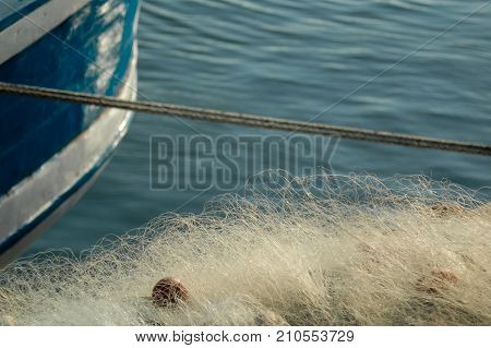 fishing net of a boat in a mediterranean port