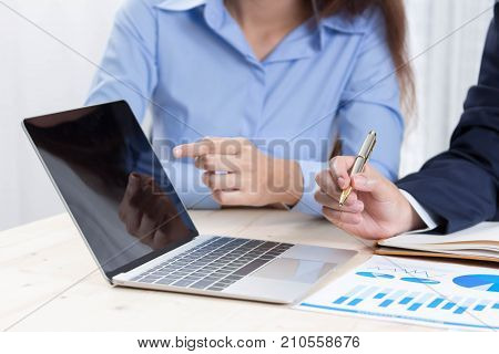 business man working adviser analyzing financial figures denoting