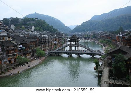 HUNAN CHINA - SEPTEMBER 22 : Old houses in Fenghuang ancient city ( Phoenix town ) on SEPTEMBER 22 2017 in Hunan Province China.
