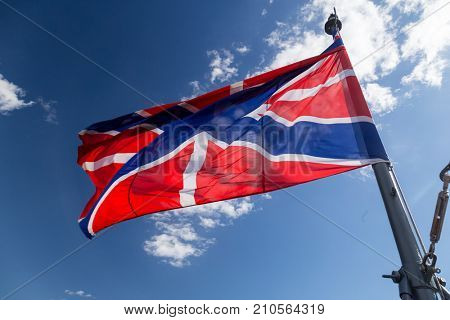 Flag on cruiser Aurora. Linear cruiser Aurora, the symbol of the Great October Socialist Revolution
