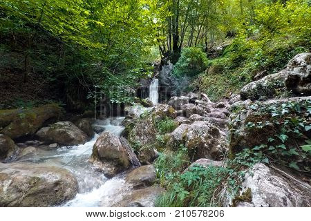 waterfall in the mountains in Montenegro in summer