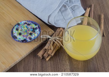 Tasty cupcakes on a white wooden table