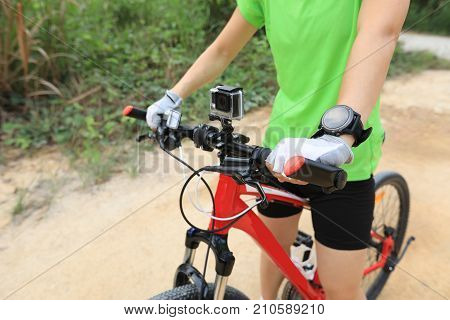 closeup of action camera mounted on mountain bike