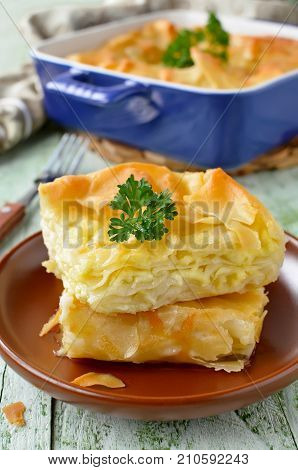 Cheese puff pie from unleavened dough. Georgian cuisine - khachapuri Achma