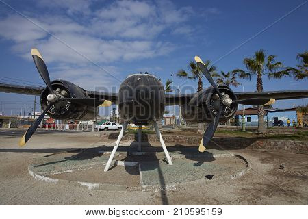 MEJILLONES, ANTOFAGASTA REGION, CHILE - SEPTEMBER 1, 2017: Historic aircraft, Douglas A 26 Invader, in the coastal city of Mejillones in the Antofagasta Region of Chile.