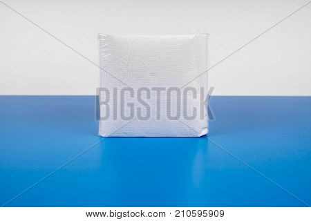 paper napkin isolated on white turquoise background.