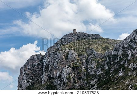 Albercutx watchtower from mirador Es Colomer in Pollenca, Majorca (Balearic Islands, Spain)