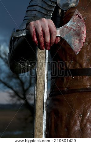 Knight Holds A Bloody Axe