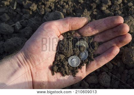 Hand Holding Roman Denarius (roman Silver Coin)