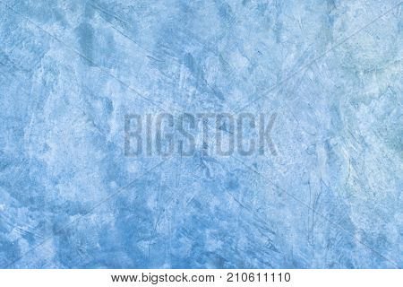 Abstract blue background raw exposed cement with texture.