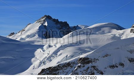 Autumn scene in the Swiss Alps. Mount Gletscherhorn.