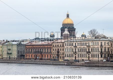 Old historical buildings on the English Embankment of Saint Petersburg (formerly named Leningrad). The city was founded by Tsar Peter the Great on 1703. Russia.