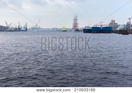 View of river and sea ships on the Neva River in St. Petersburg near the Lieutenant Schmidt embankment. Russia