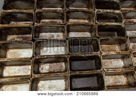 Old dirty oven baking tray. Loaf empty baking tin.