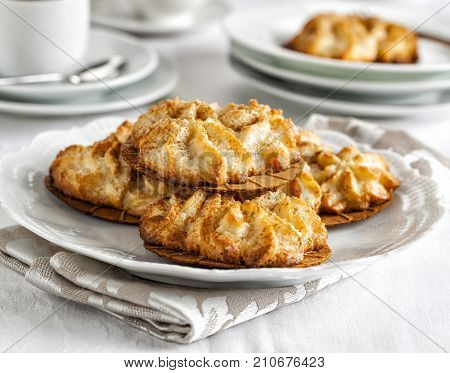 Homemade almond cookies served on a white plate