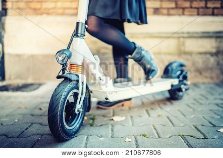 Close Up Details Of Modern Transportation, Electric Kick Scooter, Portrait Of Girl Riding The City T