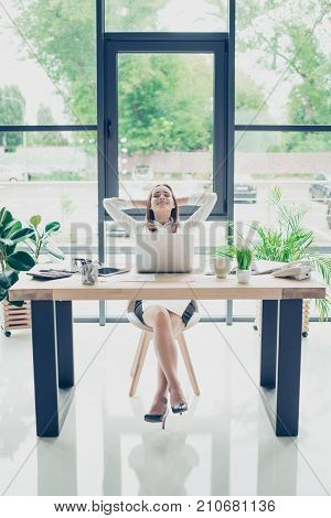 Successful Relaxed Lawyer Is Resting At Her Work Station And Dreams Of Holiday Which Is Coming, With