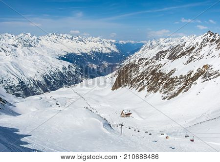 Ski and cable car on the ski resort in Austria Alps. Winter landscape.