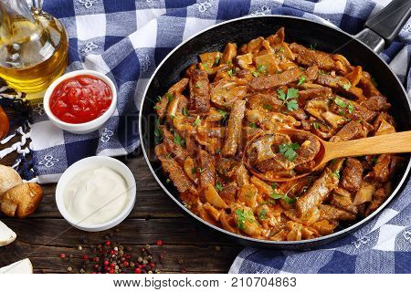 delicious beef stroganoff with porcini stewed in sour cream