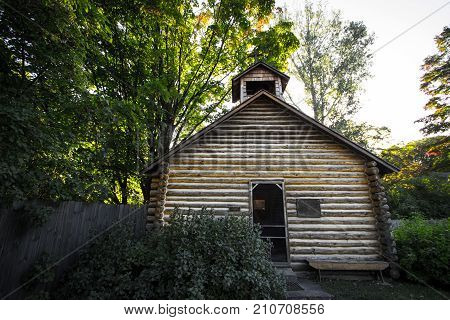 Historical One Room Schoolhouse. Front entrance of a historic log one room schoolhouse.