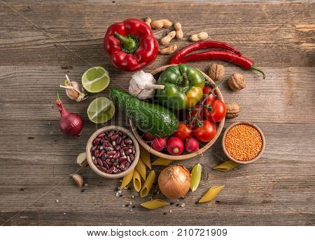 Cut lemot and pepper, fresh veggies, topview