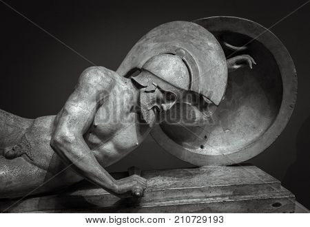 Man in helmet Greek ancient sculpture of warrior