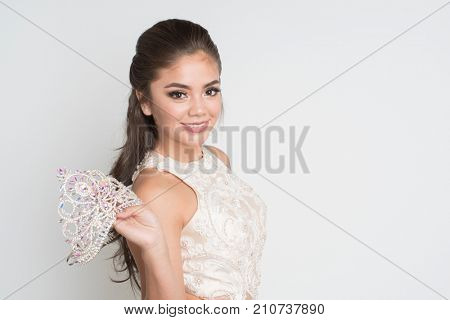 Teen girl competing in a beauty pageant