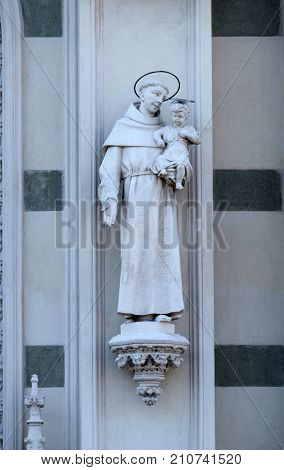 ROME, ITALY - SEPTEMBER 02: Statue of St. Anthony of Padua on the facade of Sacro Cuore del Suffragio church in Rome, Italy  on September 02, 2016.