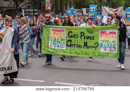 Adelaide, AU - October 22, 2017: Hundreds of supporters of Marriage Equality gather at Adelaide's Old Parliament House to march for equal rights.