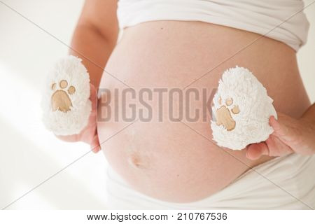 The Stomach Of A Pregnant Woman And Baby Stuff Socks