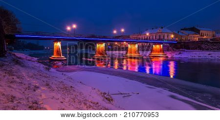 Panorama Of Bridge Through The River Uzh At Night