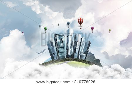 Green flying island among clouds with urban view of towers and skyscrapers. Flying aerostates and blue cloudy skyscape on background. 3D rendering.