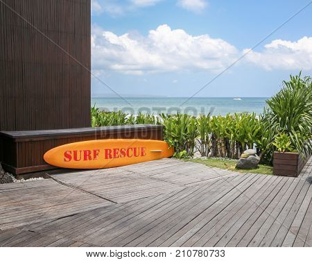 Yellow surf rescue board by the sea. Ocean view