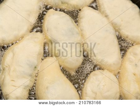 cakes fried in a pan . Photos in the studio