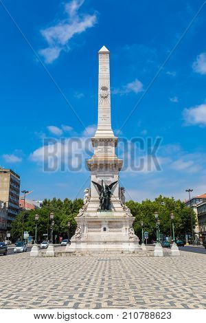 Lisbon Portugal - June 12 2016: Monument To The Restorers On Restauradores Square In Lisbon In A Bea