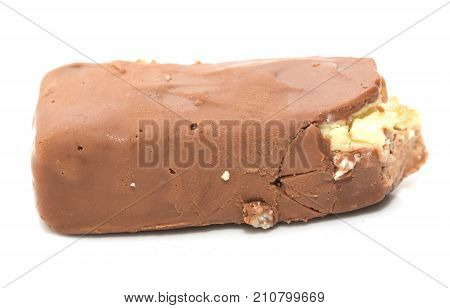 bitten off chocolate on white background Photos in the studio