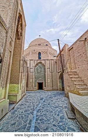 Narrow street in the old part of the Nain city, Iran.