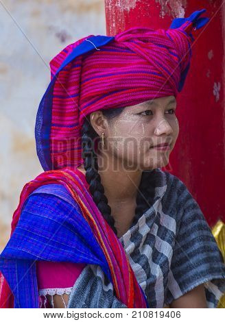 INLE LAKE MYANMAR - SEP 07 : Portrait of Intha tribe woman in Inle lake Myanmar on September 07 2017 The Intha people live along the Inle lake shores and on the lake itself