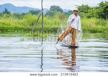 INLE LAKE MYANMAR - SEP 07 : Burmese fisherman at Inle lake Myanmar on September 07 2017 inle Lake is a freshwater lake located in Shan state