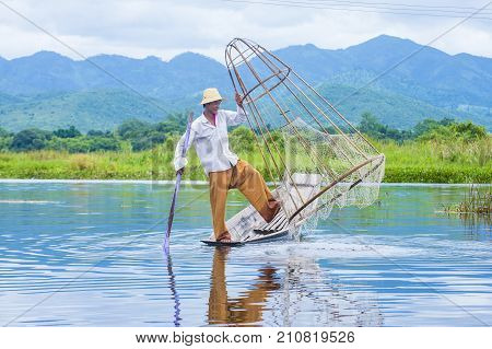 INLE LAKE MYANMAR - SEP 07 : Burmese fisherman at Inle lake Myanmar on September 07 2017 inle Lake is a freshwater lake located in Shan state