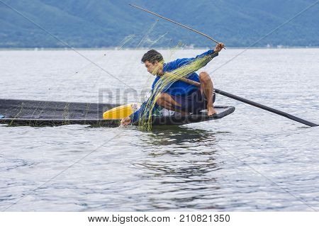 INLE LAKE MYANMAR - SEP 07 : Burmese fisherman at Inle lake Myanmar on September 07 2017 inle Lake is a freshwater lake located in Shan state